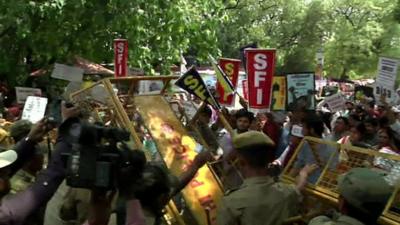 Police control protesters in Delhi