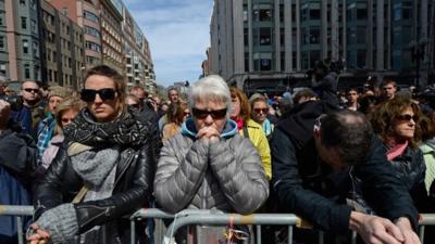 People taking part in the moments silence in Boston