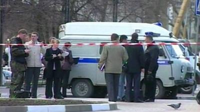 Police officers at the scene of the attack