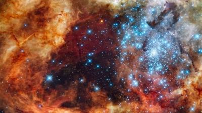 Blue stars wreathed by warm, glowing clouds