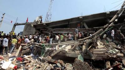 Rescue workers search for survivors, Dhaka