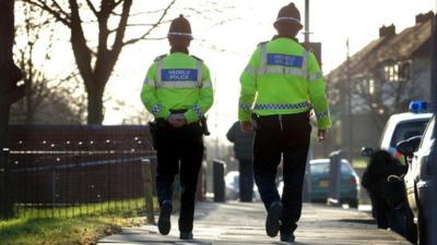 Police patrolling the streets