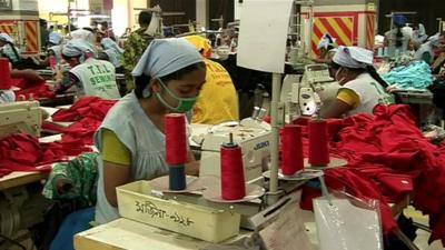 A worker at a sewing machine in a Bangladesh factory