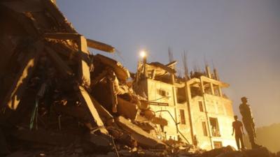 Rescue workers at the collapsed garment factory