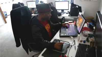 Lateef Martin working at a computer