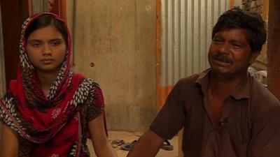 Habibur Rehman and his rescued daughter