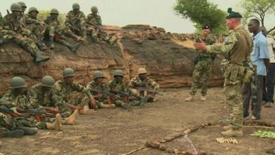 Mali troops being taught