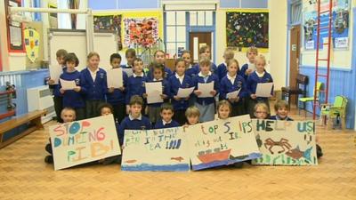 School children performing their rap