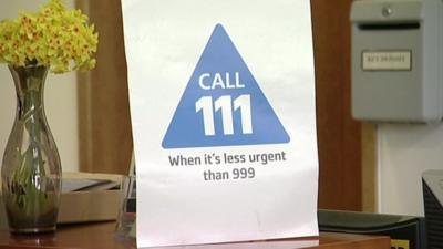 Poster reads 'Call 111 when it's less urgent'