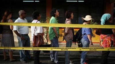 Voters queue in Kuala Lumpur