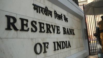 An Indian policeman stands guard outside the head office of the Reserve Bank of India (RBI) in Mumbai