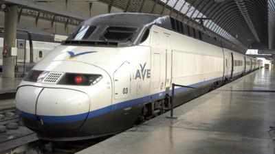 The front of an AVE (Alta Velocidad Ferroviaria) train on the platform in Seville, Spain