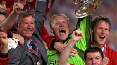 Sir Alex Ferguson celebrates winning the Champions League in 1999