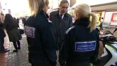 Paddy Tipping talking to PCSOs