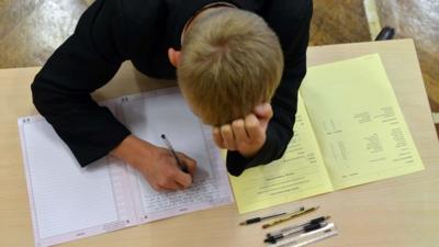 Boy doing an exam.