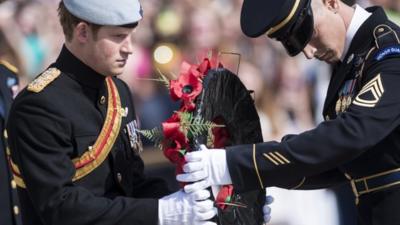 Prince Harry laying wreath