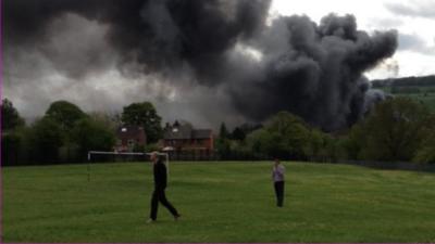 Smoke rising from the old Thorntons warehouse in Belper, Derbyshire