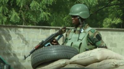 Soldier at checkpoint