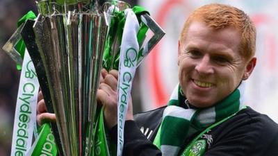 Celtic manager Neil Lennon with the SPL trophy