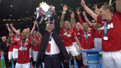 Sir Alex Ferguson lifts the Premier League trophy