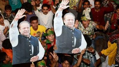 Supporters of Nawaz Sharif celebrate in Lahore. 12 May 2013