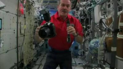 Commander Chris Hadfield with his camera