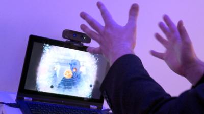 A man uses Intel's 'perceptual computing'