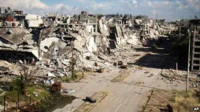 Photograph posted online by Lens Young Homsi purportedly showing war-damaged buildings in Homs, Syria (13 May 2013)