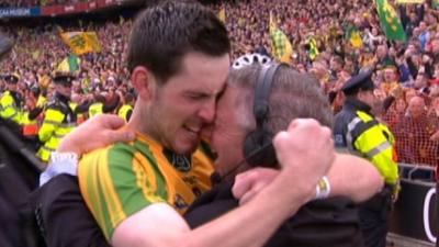 Mark McHugh celebrates winning the All Ireland final with his father Martin McHugh