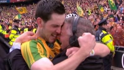 Mark McHugh celebrates winning the All Ireland final with his father Martin McHugh