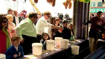 Prince Harry at fairground attraction in New Jersey