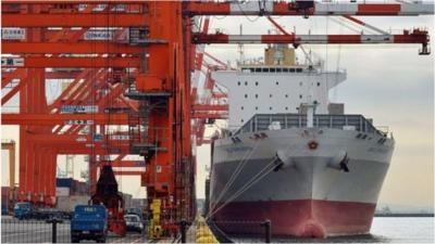 Ship being unloaded in Tokyo port