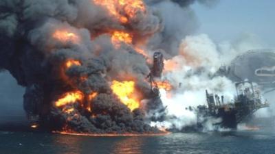 Smoke and flames rise from the Deepwater Horizon wellhead in the Gulf of Mexico