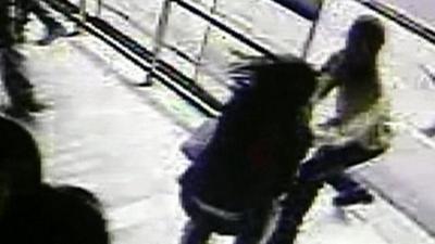 CCTV of man grabbing a woman's phone