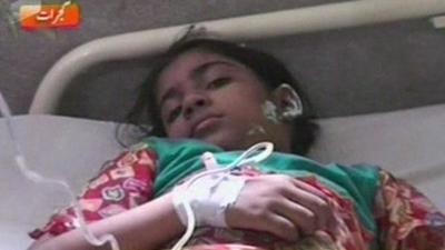 Girl in hospital bed