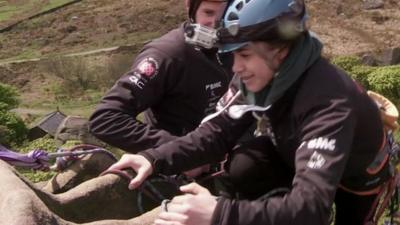 Molly Thompson-Smith scaling a rockface