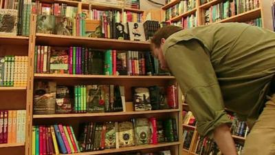 Man in bookshop