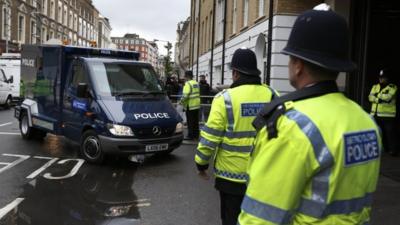 A police van believed to be transporting 22-year-old Michael Adebowale