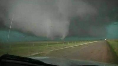 View from a car of the approaching tornado