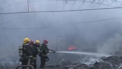 Scene inside burnt out poultry plant, Dehui in Jilin province, China