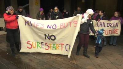 Parents and children protest against the plans
