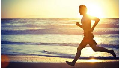 Runner on a beach