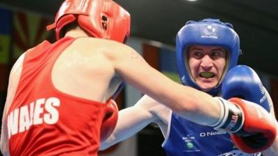 Ashley John Williams in action against Paddy Barnes