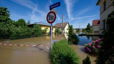Flooded streets can be seen in Dresden"s Gohlis district