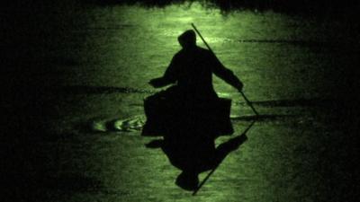 Coracle fishing by night