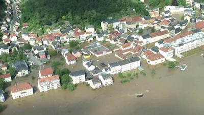 Aerial view of houses and flood water