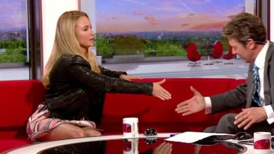 Hayden Panettiere gets to grips with Breakfast's Charlie Stayt