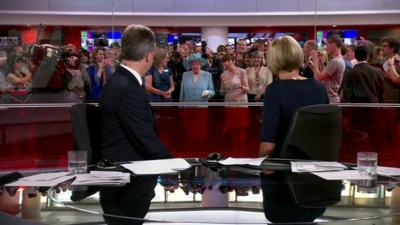 The Queen behind the BBC newsroom studio