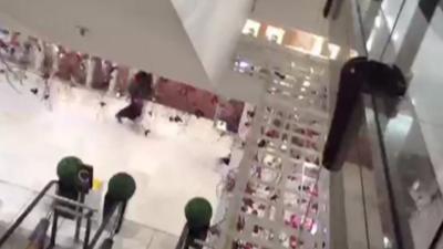 Man running out of Selfridges