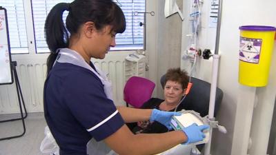 Cancer patient with nurse